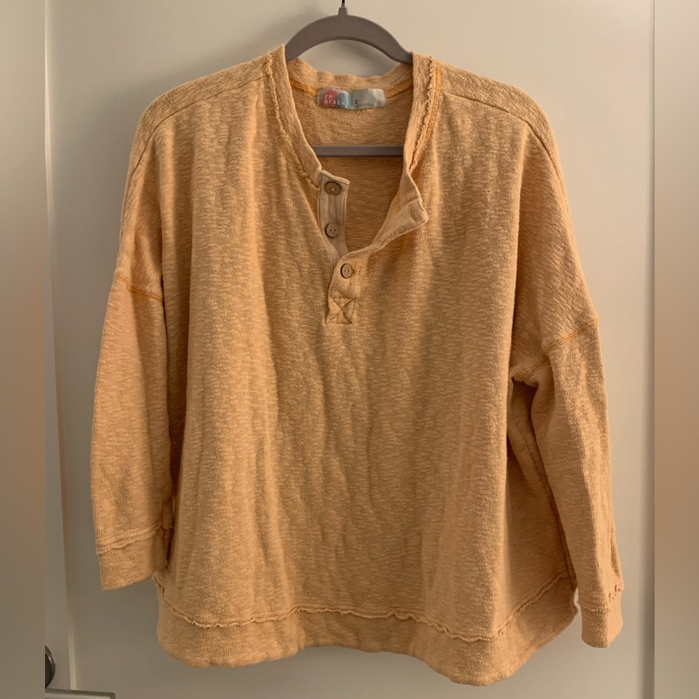 Free People light orange oversized shirt
